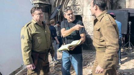 Made in Berlin-Brandenburg. George Clooney (Mitte) drehte in der Region den Kinofilm „Monuments Men“ mit John Goodman (li.) und Jean Dujardin.