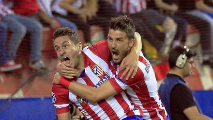 Atletico jubelt. Jorge "Koke" Resurreccion Merodio (li.) und David Villa. 