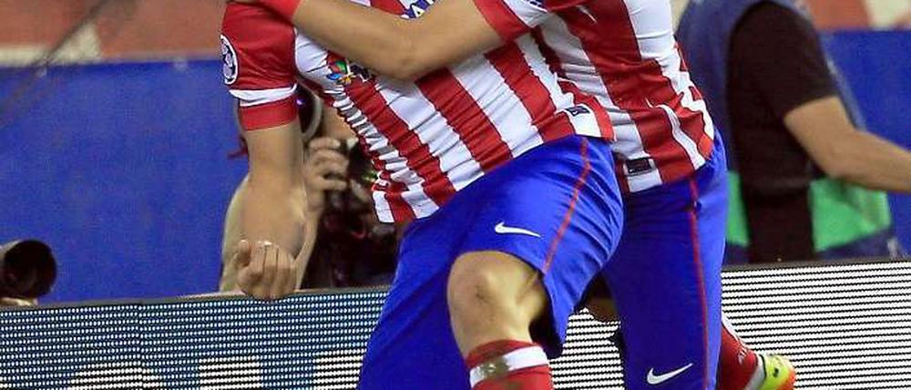 Atletico jubelt. Jorge "Koke" Resurreccion Merodio (li.) und David Villa. 