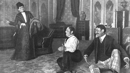 Szenenbild aus dem Residenz-Theater 1901. Die Schauspieler Richard Georg und Richard Alexander am Boden sitzend, daneben stehend die Schauspielerin Ida Becker.