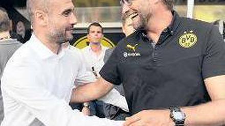 Gentleman gegen Kumpeltyp. Guardiola (l.) und Klopp haben wenig gemein.