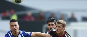 Torschütze Sandro Wagner im Zweikampf mit Lars Bender. Emre Can schaut zu.
