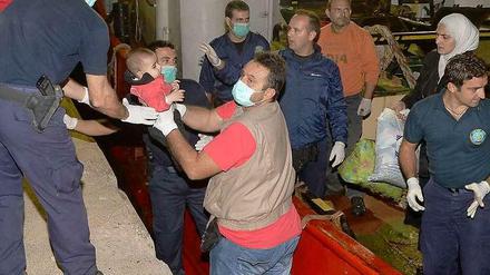 Überlebt: Flüchtlinge in Griechenland.