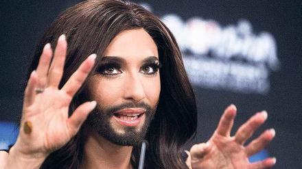 Geschlechterrollen sind nicht immer eindeutig. Conchita Wurst mit Bart und Perücke nach ihrem Sieg in Kopenhagen.