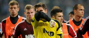 Achter Abstieg: Die Spieler des 1. FC Nürnberg können es nicht fassen.
