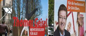 Plakate von SPD und CDU in Düsseldorf.