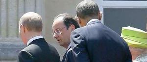 Dicht beisammen. Russlands Präsident Putin, Frankreichs Staatschef Hollande, US-Präsident Obama und die britische Königin Elizabeth II. (v.l.n.r.)