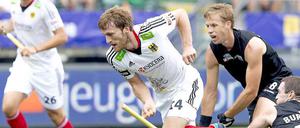 Die deutschen Hockey-Männer um Benedikt Furk haben ihre Minimalchance auf das WM-Halbfinale gewahrt.