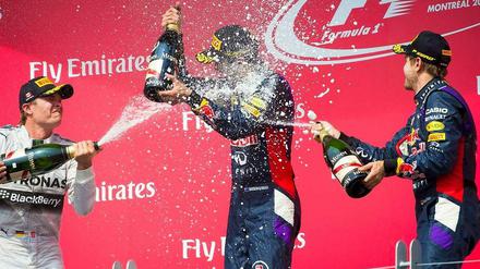 Daniel Ricciardo (Mitte), Nico Rosberg (l.) und Sebastian Vettel (r.) auf dem Siegerpodest in Kanada.