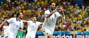 Ein Herz für Griechenland. Georgios Samaras (vorn) feiert sein spätes Elfmeter-Tor gegen die Elfenbeinküste.
