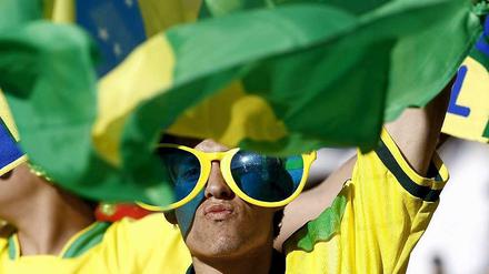 Die meisten Banker tippen darauf, dass die Brasilianer gewinnen.