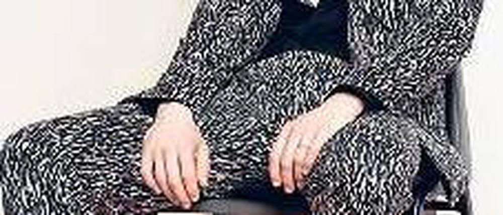 Der Berliner Mann trägt Anzug, hier von K. Kerner.