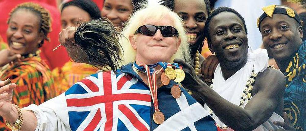 Spitze des Eisbergs. Wie konnte es sein, dass das pädophile Treiben des BBC-Stars Jimmy Savile jahrelang nicht verfolgt wurde? 