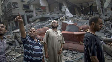 In Trümmern. Immer wieder werden Wohnhäuser in Gaza getroffen. Israels Armee erklärt, die Hamas nutze die Zivilbevölkerung gezielt als Schutzschilde.