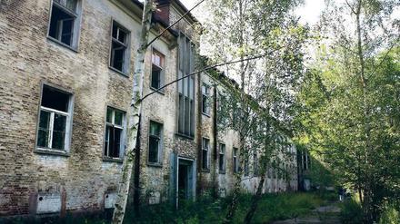Exerzierplatz ade. Die denkmalgeschützten Mannschaftsgebäude aus den Dreißigerjahren sollen in Krampnitz als erstes saniert werden. 