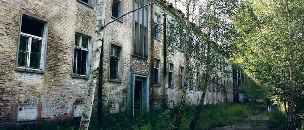 Exerzierplatz ade. Die denkmalgeschützten Mannschaftsgebäude aus den Dreißigerjahren sollen in Krampnitz als erstes saniert werden.