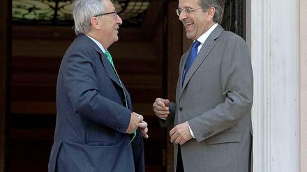 Der designierte EU-Kommissionschef Juncker (links) und Griechenlands Premier Samaras am Montag in Athen.