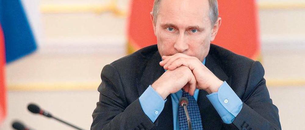 Getroffener Mann? Der russische Präsident Wladimir Putin – hier am Mittwoch im Kreml – reagiert bisher verhalten und belässt es bei Nadelstichen.