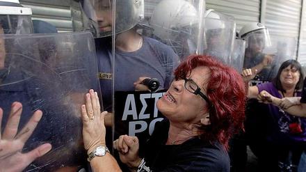 Ungeliebte Kontrolleure. Einwohner in Athen protestieren gegen einen Besuch der Troika in der griechischen Hauptstadt.