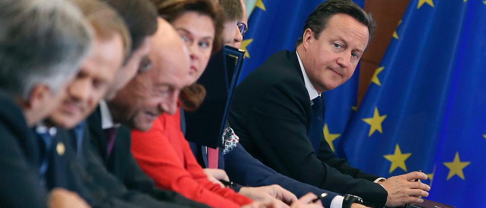 Mit dieser Flagge können wenige Briten noch etwas anfangen: Der britische Premier Cameron (rechts) in Brüssel