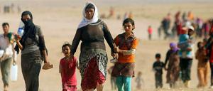 Flüchtlinge im Irak. Deutschland will die Kurden im Kampf gegen die IS-Dschihadisten mit Ausrüstung unterstützen.