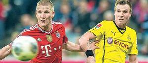 Schluss mit lustig. Die Nationalspieler Bastian Schweinsteiger (l.) und Kevin Großkreutz treffen am Mittwoch als Münchner und Dortmunder wieder als Gegner aufeinander.