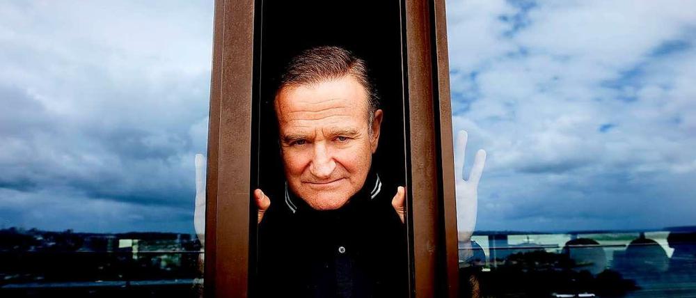 Robin Williams posiert für Fotografen in Australien.