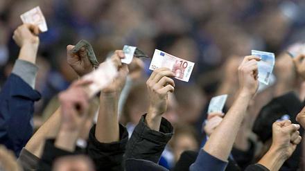 Fußball passt gut in den Kapitalismus, beide eint der konservative Grundgedanke, meint unser Autor.