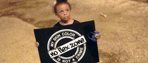 Die Lage verbessern. Auch dieses kleine Mädchen protestiert in Ferguson gegen die Erschießung von Michael Brown. 