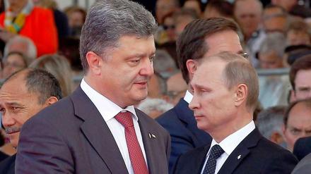 Keine Freunde: Petro Poroschenko und Wladimir Putin bei den D-Day-Feierlichkeiten in diesem Jahr in Frankreich.