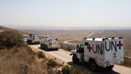 Ein Konvoi der Undof-Mission der Vereinten Nationen fährt auf den Golanhöhen entlang. Zuvor hatte eine Undof-Eingreiftruppe UN-Soldaten in Sicherheit gebracht.