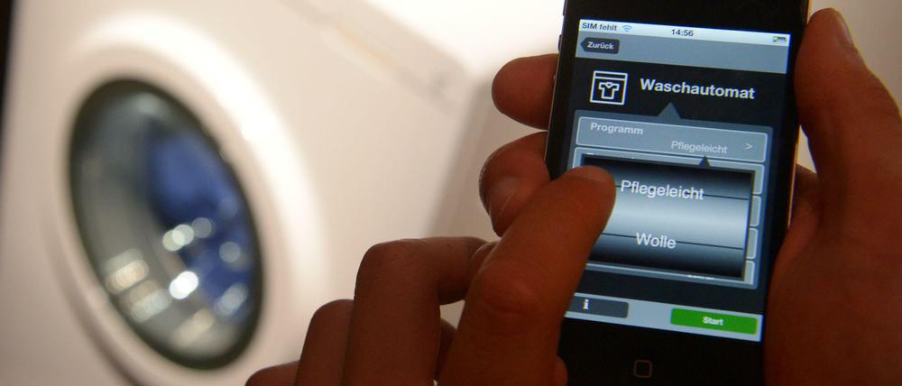 Ferngesteuert. Mittlerweile lassen sich Waschmaschinen auch per App programmieren.
