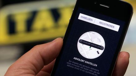 Bestellung per App. Immer mehr Firmen wollen mit Fahrdiensten Geld verdienen.