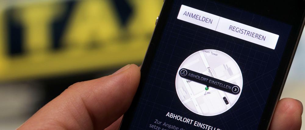 Bestellung per App. Immer mehr Firmen wollen mit Fahrdiensten Geld verdienen.