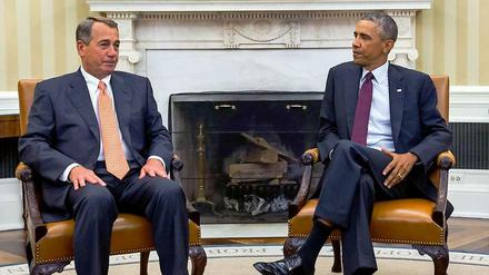 US-Präsident Barack Obama (r.) mit dem Sprecher des Repräsentantenhauses, John Boehner, beim Treffen mit führenden Kongressmitgliedern am Dienstagabend.