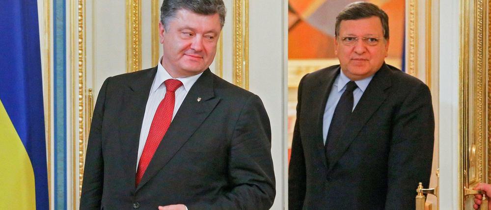 Türen öffnen sich, sie können aber auch zugeschlagen werden. Die Ukraine und Präsident Poroschenko suchen Annäherung an die EU mit Kommissionspräsident Jose Manuel Barroso.