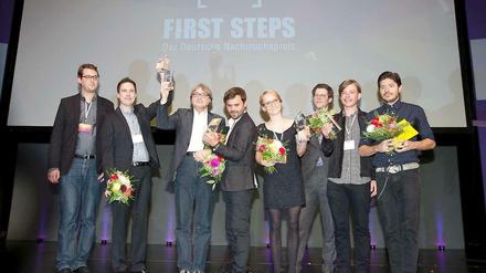 Die Preisträger der First Steps Awards: Sebastian Cordes (l-r), Pascal Flörks, Heinz Badewitz, Stefan Bohun,Julia Hönemann, Maximilan Haslberger, Andreas Bruns und Damian John Harper. 