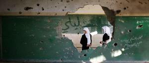 Alltag in Trümmern: Noch scheint die Waffenruhe zu halten, auch wenn ein Geschoss auf Israel abgefeuert wurde.