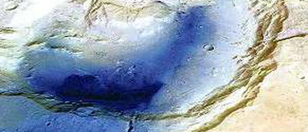 Explodiert. Ein gewaltiger Ausbruch formte diesen Krater auf dem Mars. Die Aufnahme entstand mit Hilfe der Marssonde HRSC, die unter anderem von Berliner Forschern entwickelt wurde. 