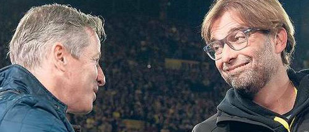 Mienenspiel. Von Dortmunds Jürgen Klopp (r.) und Schalkes Jens Keller waren in dieser Saison oft lange Gesichter zu sehen. An diesem Samstag könnte einer von beiden gut lachen haben.
