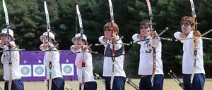 Nationalhelden mit Pfeil und Bogen. Das südkoreanerische Bogenschießen-Team bei den Olympischen Spielen in London.