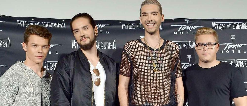 Die Musiker Georg Listing, Tom Kaulitz, Bill Kaulitz und Gustav Schäfer (v.l.n.r.) von Tokio Hotel stellen am 2.Oktober in Berlin ihr neues Album "Kings Of Suburbia" vor, das am Freitag erscheint. 