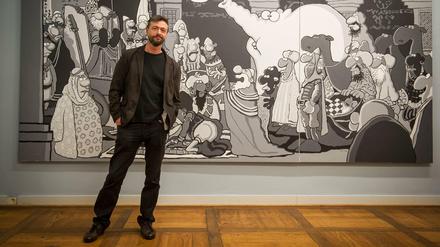 Moderner Klassiker: Ralf König vor einem seiner Werke in der Ausstellung in Hannover.