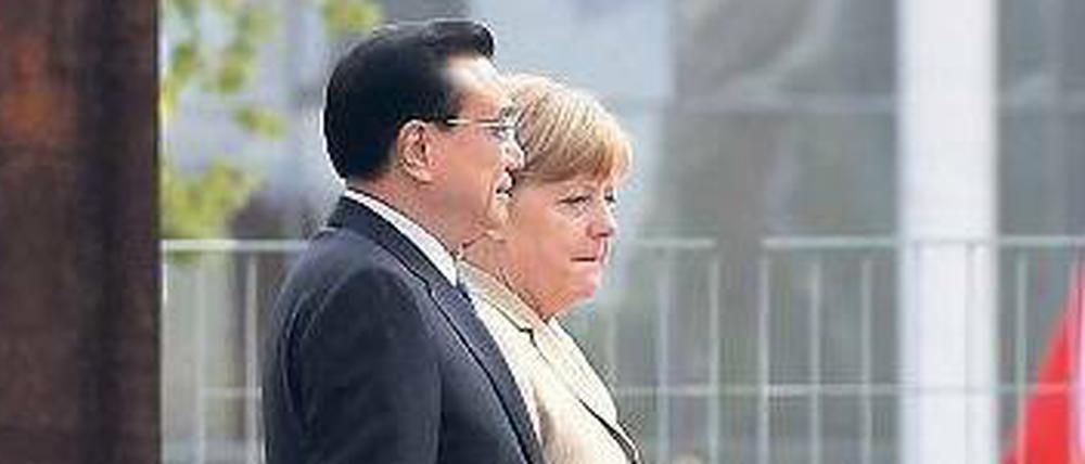 Erst die Wirtschaft, dann das Vergnügen. Kanzlerin Angela Merkel und Chinas Premierminister Li Keqiang.