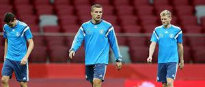 Relikt. Die Zeit, da Lukas Podolski (Mitte) eine feste Größe in der Nationalelf war, ist längst vorbei. 