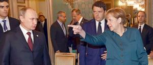 Kanzlerin Angela Merkel und Russlands Präsident Wladimir Putin in Mailand.