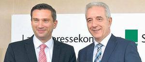 Ministerpräsident Stanislaw Tillich (rechts) und SPD-Verhandlungsführer Martin Dulig.