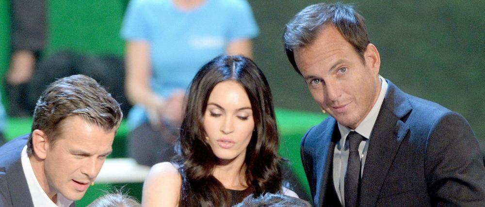 unen, wundern, rätseln. Der kanadische Komiker Will Arnett (rechts) in der "Wetten, dass..?"-Ausgabe vom 4. Oktober