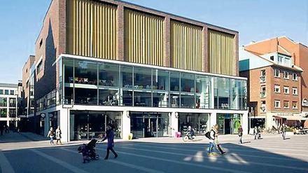 Das ehemalige Parkhaus in der Stubengasse in Münster (Nordrhein-Westfalen), in dem nach seiner Umnutzung inzwischen unter anderem ein Möbelhaus, ein Rad-Parkhaus sowie Büros und zahlreiche Wohnungen entstanden sind.