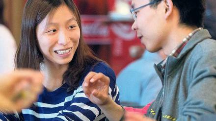 Im Studium. Diskriminieren Gebühren internationale Studierende? 
